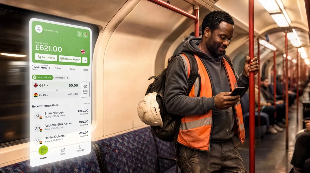 Construction worker on the London Underground smiling at his phone after sending money home with an international money transfer service